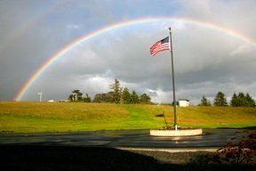 US Flag under Rainbow